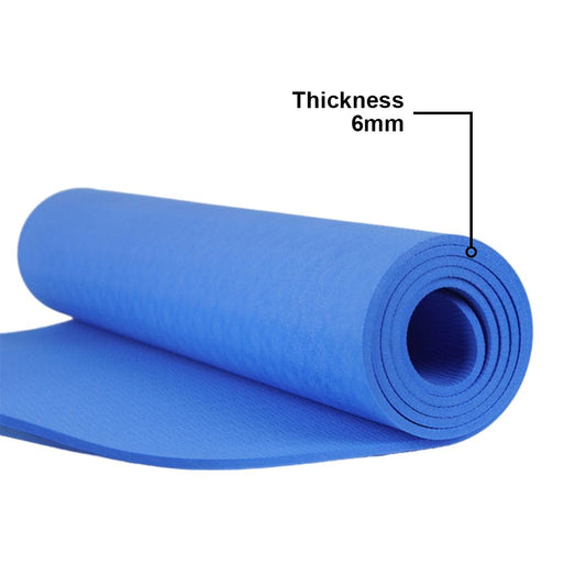 Rolled blue Eka Yoga Mat made of TPE, highlighting 6mm thickness