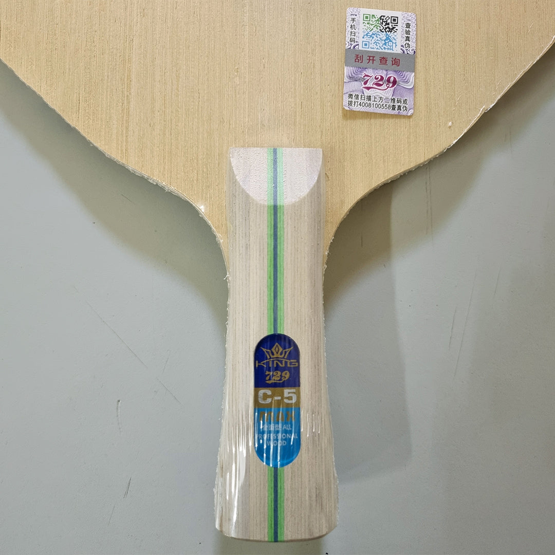 Detailed view of 729 C5 wooden table tennis blade showcasing handle branding