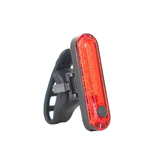 A red bicycle tail light with a black mount, designed to be attached to the back of a bicycle.